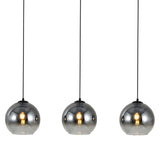 Sort pendellampe med falmet glas – 3 aflang lyskilder | Monari