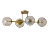 Loftlampe Guld - 4 Ravfarvede Glaskugler - Joy