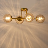 Loftlampe Guld - 4 Ravfarvede Glaskugler - Joy