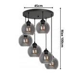 Hanglamp glas amber met 6 smoke bollen boven eetkamer