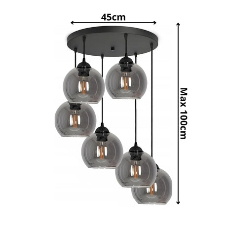 Hanglamp glas amber met 6 smoke bollen boven eetkamer