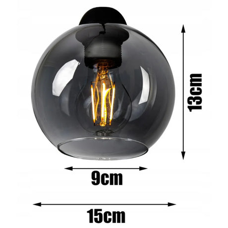 Zwarte hanglamp industrieel met smoke glazen bol voor eettafel