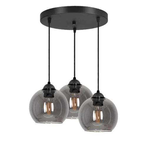 3-lichts hanglamp smoke glas boven eettafel industrieel