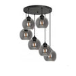Hanglamp glas amber met 6 smoke bollen boven eetkamer